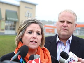 Gino Donato/The Sudbury Star
Andrea Horwath, leader of Ontario’s New Democrats, along with NDP Sudbury MPP Joe Cimino, vowed to fight the sell-off of public assets by the Liberals at a press conference Monday in front of the Long Lake LCBO location. The announcement in Sudbury is part of the party leader’s tour of the province. Horwath and her NDP caucus are meeting with families, community leaders, labour, businesses and other groups about the impact of selling public assets. The Premier's Advisory Council on Government Assets has been meeting privately with bidders. The group is headed by TD Bank Group President and CEO Ed Clark.The New Democrat leader chargedt a sale would mean more expensive hydro bills for families and business in Sudbury, and deprive the province of $1.7 billion annually from the LCBO that goes directly into paying for the services on which families rely.