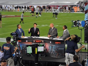 ESPN Monday Night Football commentators at Raymond James Stadium in Tampa, Florida.  (Al Messerschmidt/Getty Images/AFP)