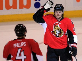 Defencemen Chris Phillips and Erik Karlsson are the frontrunners for the Senators captaincy. (Ottawa Sun Files)