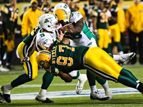 Eddie Steele gets to the quarterback late in Friday's game against Saskatchewan (Codie McLachlan, Edmonton Sun).