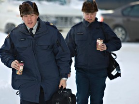 RCMP offers are seen wearing a muskrat fur hat in this file photo taken January 11, 2011.  (JORDAN VERLAGE/QMI AGENCY)