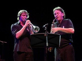 Al Weiss and his son Parker perform together at the their inaugural benefit concert held at Imperial Theatre last year. The Breast Cancer Society of Canada used $10,000 in proceeds from the concert to make a $5-million commitment to research at London Health Sciences Centre. SUBMITTED PHOTO