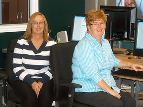 Contact North's Shannon Stuart, left and Sandra Couture help students with online learning. Contact North is hosting a grand re-opening on Friday, Oct. 3 from 10 a.m. to 3 p.m.. Their new location is at 1416 Dufferin Avenue, beside the Goodwill Donation Center.