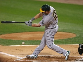 Adam Dunn #10 of the Oakland Athletics strikes out in the 2nd inning against the Chicago White Sox at U.S. Cellular Field on September 10, 2014 in Chicago, Illinois. (Jonathan Daniel/Getty Images/AFP)