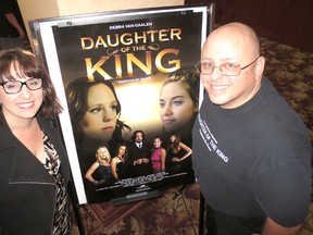 Angela Corso, program manager of the Chatham-Kent Women's Centre, and director Matthew Marshall pose by a poster of his film, Daughter of the King. The full-length movie stars Debra van Gaalen of Chatham. The CKWC and Marshall presented a “hometown” screening of the film at the St. Clair College Capitol Theatre on Sept. 24.
