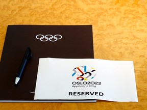 A sign is placed on a table for members of the Oslo 2022 delegation at the start of the Executive Board meeting at the International Olympic Committee (IOC) headquarters. (REUTERS/Denis Balibouse)