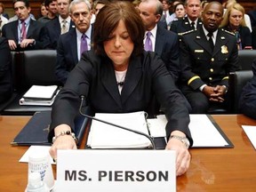 U.S. Secret Service Director Julia Pierson takes her seat to testify at the House Oversight and Government Reform Committee hearing on "White House Perimeter Breach: New Concerns about the Secret Service" on Capitol Hill in Washington September 30, 2014.   REUTERS/Kevin Lamarque
