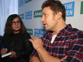 Rita DeMontis interviews celebrity chef Jamie Oliver on Wednesday, Oct. 1, 2014. (Veronica Henri/Toronto Sun)