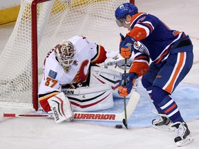 David Perron, shown here in action against the Calgary Flames on Sept. 21, says he enjoys playing on a line with first-round draft pick Leon Draisaitl. (David Bloom, Edmonton Sun)