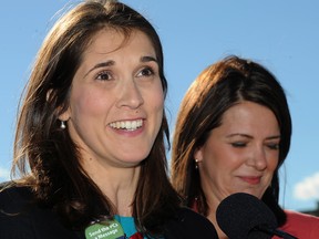 School trustee and former CBE chair Sheila Taylor (L) speaks to the media next to Wildrose leader Danielle Smith as Taylor announced she was running for the Wildrose in Calgary West  on Wednesday October 1, 2014. The announcement was made on Signal Hill in SW Calgary, Alta. Stuart Dryden/Calgary Sun/QMI Agency