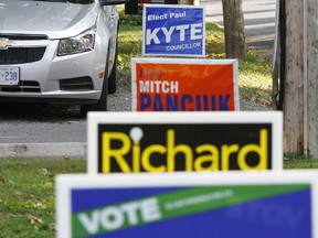 A series of municipal election signs on Williams Street, south of Victoria Avenue in Belleville, Ont. Wednesday, Oct. 1, 2014.  - JEROME LESSARD/THE INTELLIGENCER/QMI AGENCY