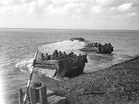 Buffalo amphibious vehicles take Canadians across the Scheldt in Zeeland, the westernmost province of the Netherlands, in 1944. (Donald I. Grant, Dept. of National Defence/Library and Archives Canada)