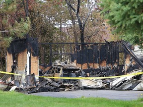 A fire destroyed a garage on Lincoln Road in New Sudbury on Wednesday night. JOHN LAPPA/THE SUDBURY STAR/QMI AGENCY