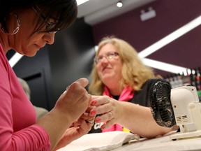 Amy Doyle, Manager of the Hastings-Prince Edward Counties and Brighton Community Office of the Canadian Cancer Society gets her nails painted pink Wednesday during the kickoff of breast cancer awareness month at Liv Nail Bliss at the Quinte Mall in Belleville.
Emily Mountney-Lessard/The Intelligencer