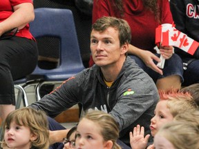 Canadian Olympian Simon Whitfield participates in a special assembly for hundreds of students at Mother Teresa Catholic School on Thursday.  (Julia McKay/The Whig-Standard)