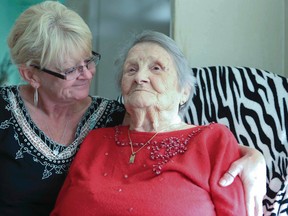Sharon Ryan with her late husband's grandmother Edith Ryan, 104, in their Scarborough home on Thursday, Oct. 2, 2014. (Veronica Henri/Toronto Sun)