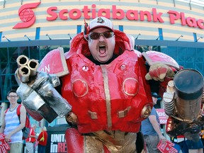 Ottawa Senators fans gather before Game 3 of the Eastern Conference Quarterfinals against the Canadiens during the 2013 NHL Stanley Cup Playoffs at Scotiabank Place on May 5, 2013 in Ottawa. Jeremy Strydonck, aka Senatron, before Sunday's game. Tony Caldwell/Ottawa Sun/QMI Agency