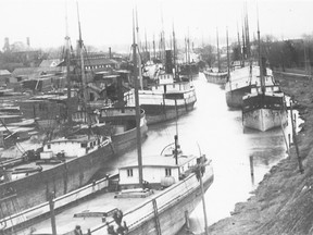 Ships sit along Marine City's Belle River in the early 1900s. 
(SUBMITTED PHOTO)