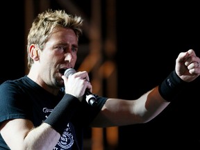 Musician Chad Kroeger of Nickelback performs during the Alberta Flood Aid concert at McMahon Stadium in Calgary, Alta. on Thursday, Aug. 15, 2013. (Al Charest/QMI Agency)