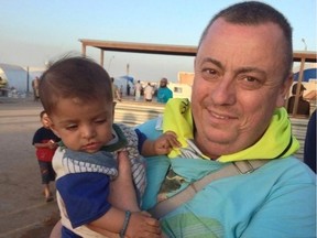 An undated family handout photo of British aid worker Alan Henning taken at a refugee camp on the Turkish-Syria border. REUTERS/Henning family handout via the British Foreign and Commonwealth Office/Handout via Reuters