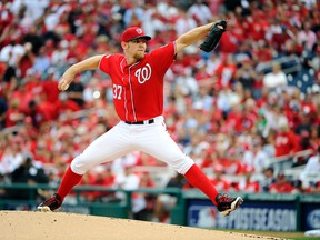 Washington Nationals starting pitcher Stephen Strasburg (37) pitches against the San Francisco Giants in the first inning of game one of the 2014 NLDS playoff baseball game at Nationals Park on Oct 3, 2014 in Washington, DC, USA. (Brad Mills-USA TODAY Sports)
