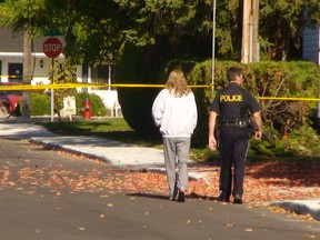 OPP along Charles St. in Arnprior on Friday, Oct. 3, 2014 where a woman was hit and killed by a truck on Thursday afternoon. Her husband has been arrested.
Danielle Bell/Ottawa Sun/QMI AGENCY