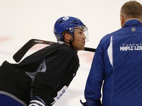 Defenceman Stephane Robidas listens intently as coach Randy Carlyle gets his point across during Friday’s morning skate at the ACC. Robidas, coming off a broken leg last season, made his Leafs debut in Friday's exhibition game against Detroit. CRAIG ROBERTSON/TORONTO SUN)