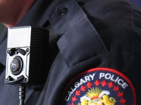 A Calgary Police officer wears a body cam. (QMI Agency file photo)