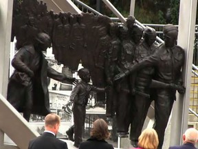 A war memorial created from the iconic Canadian Second World War image Wait For Me, Daddy, was unveiled in New Westminster, B.C., on Saturday, Oct. 4, 2014. (Photo: Screengrab from live feed on city's website/QMI Agency)