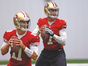 The San Francisco 49ers went with Colin Kaepernick (right) and opted to trade away Alex Smith (left) two years ago. (REUTERS)
