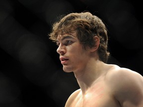 Olivier Aubin-Mercier and Chad Laprise battle in Montreal, Wednesday, April 16, 2014. (SIMON CLARK/QMI AGENCY)