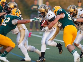The Bisons lost 38-31 to the Golden Bears on Saturday. (IAN KUCERAK/QMI Agency)