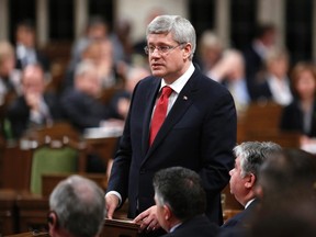 Canada's Prime Minister Stephen Harper outlines his government's plan to participate in a military campaign against Islamic State militants, in the House of Commons on Parliament Hill in Ottawa October 3, 2014.  REUTERS/Chris Wattie