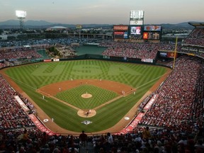 A fan was severely beaten following Friday night's playoff game between the Los Angeles Angels and the Kansas City Royals.