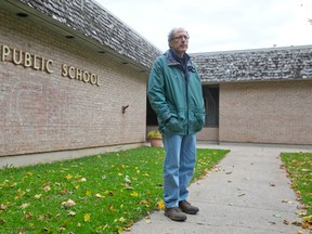 Sandy Levin stands outside of the former Sherwood Forest public school Sunday. Levin is head of the Orchard park Sherwood Forest ratepayers group. (CRAIG GLOVER, The London Free Press)