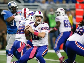 Buffalo Bills quarterback Kyle Orton (18) winds up to throw the ball during the first quarter against the Detroit Lions at Ford Field. (Raj Mehta-USA TODAY Sports)