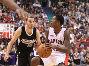 Kings’ Nik Stauskas closes in on the Raptors’ Lou Williams in Vancouver Sunday. (Carmine Marinelli/QMI Agency)