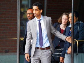 Robel Phillipos, a friend of suspected Boston Marathon bomber Dzhokhar Tsarnaev, who is charged with lying to investigators, leaves the federal courthouse after a hearing in his case in Boston, Massachusetts May 13, 2014.    REUTERS/Brian Snyder