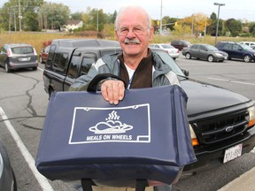 Don Gateley prepares to hit the road as a volunteer driver for Meals on Wheels, providing nutritious lunches for those who can't cook their own meals. This is Meals on Wheels Week in Canada. (Michael Lea/The Whig-Standard)