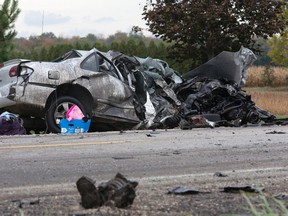 A woman, 18, died when the car she was driving collided with a truck on Fanshawe Park Rd. west of Clarke Rd. just outside London Monday. (DEREK RUTTAN, The London Free Press)