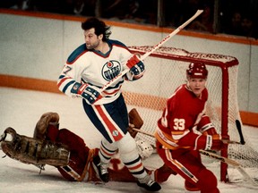 Edmonton Oilers tough guy Dave Semenko skates through the Calgary Flames goal crease at the Northlands Coliseum in an April 1984 playoff game. (EDMONTON SUN FILE)