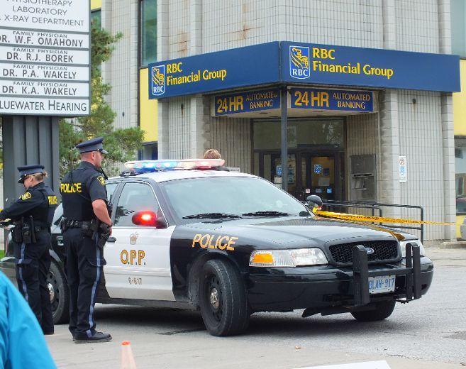 Corunna bank robbery suspect believed to be carrying firearm