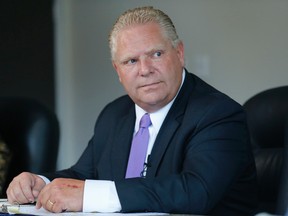 Toronto mayoral candidate Doug Ford speaks to the Toronto Sun editorial board on Monday, October 6, 2014. (Michael Peake/Toronto Sun)