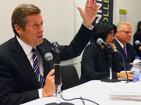 John Tory faces off against Olivia Chow and Doug Ford during a debate at Centennial College in Toronto, Ont. on Monday October 6, 2014. (Dave Abel/Toronto Sun)