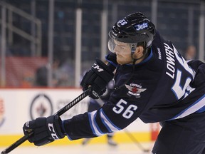 Jets rookie Adam Lowry grew up around the Saddledome while his father Dave played for the Calgary Flames.