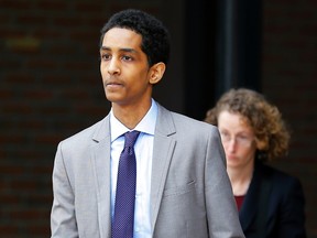 Robel Phillipos, a friend of suspected Boston Marathon bomber Dzhokhar Tsarnaev, who is charged with lying to investigators, leaves the federal courthouse after a hearing in his case in Boston, Massachusetts May 13, 2014. (REUTERS/Brian Snyder)
