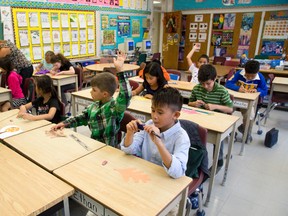 Julie Hinde's grade 4/5 class at St. Michael's Catholic School in London, Ontario on Friday, October 3, 2014. (DEREK RUTTAN, The London Free Press)