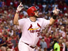 St. Louis Cardinals first baseman Matt Adams celebrates after hitting a three-run home run against the Los Angeles Dodgers in the 7th inning during Game 4 of their 2014 NLDS at Busch Stadium. (SCOTT ROVAK/USA TODAY Sports)