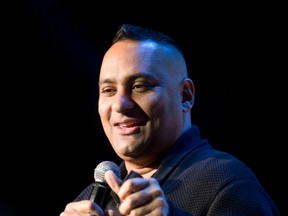 Russell Peters performs before a crowd of 5,800 at Budweiser Gardens Tuesday night as part of his Almost Famous Tour. (MIKE HENSEN, The London Free Press)