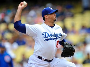 Dodgers pitcher Josh Beckett is calling it a career due to a hip injury. (Gary A. Vasquez/USA TODAY Sports)
